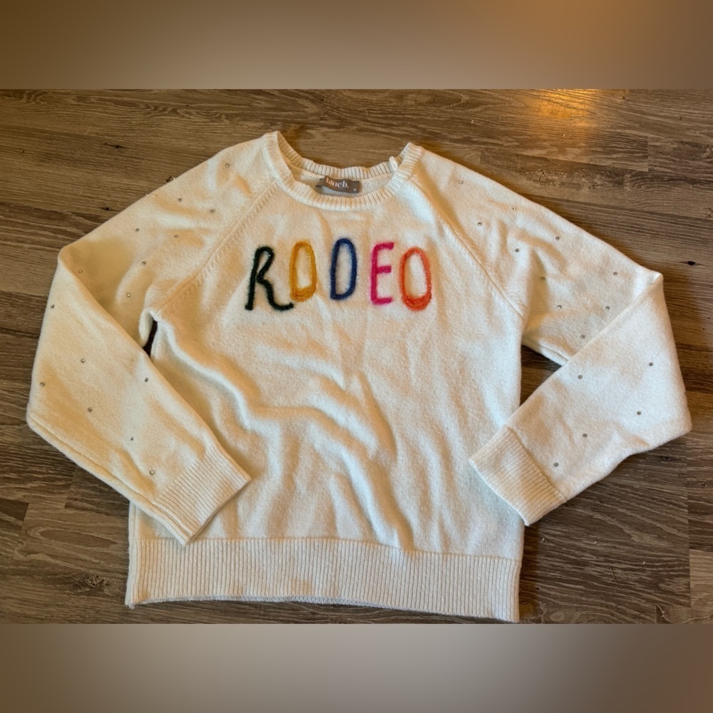 The Rhinestone Rodeo Sweater size Medium